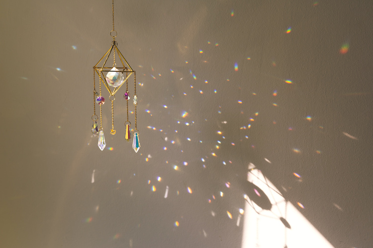 Crystal Good Feng Shui sun catcher hanging at home